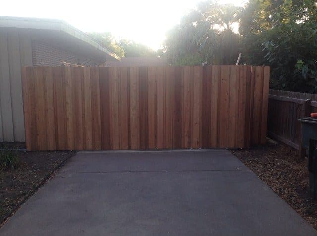 Automatic driveway gate installed by Frontier Fence & Gate